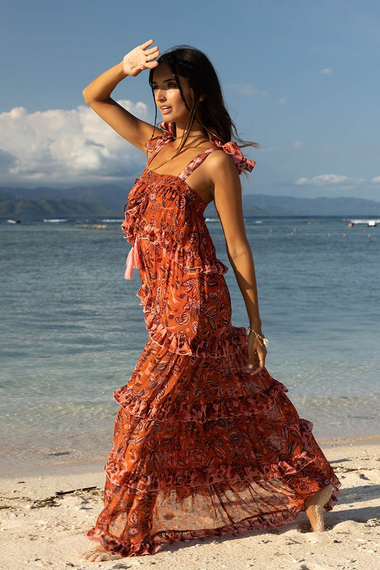 Full-length view of Woman in Miss June Leaf Print Dress