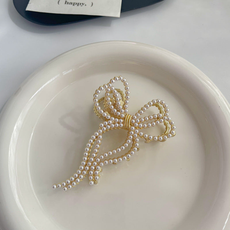 Load image into Gallery viewer, Gold Ribbon Pearl Hair Claw Clip
