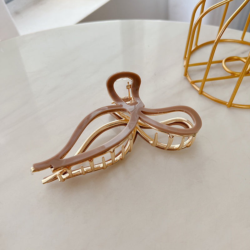 Load image into Gallery viewer, Elegant Hollow Leaf Bow Hair Claw Clips Nude
