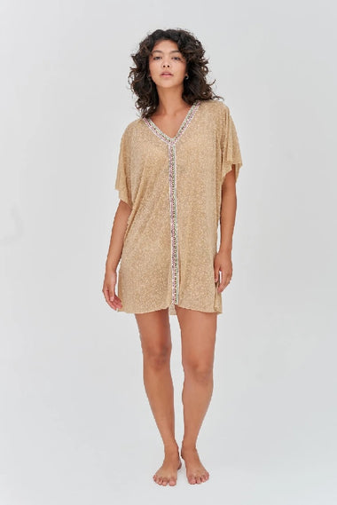 Woman wearing Pitusa's Relaxed Beach Cover Up in Beige