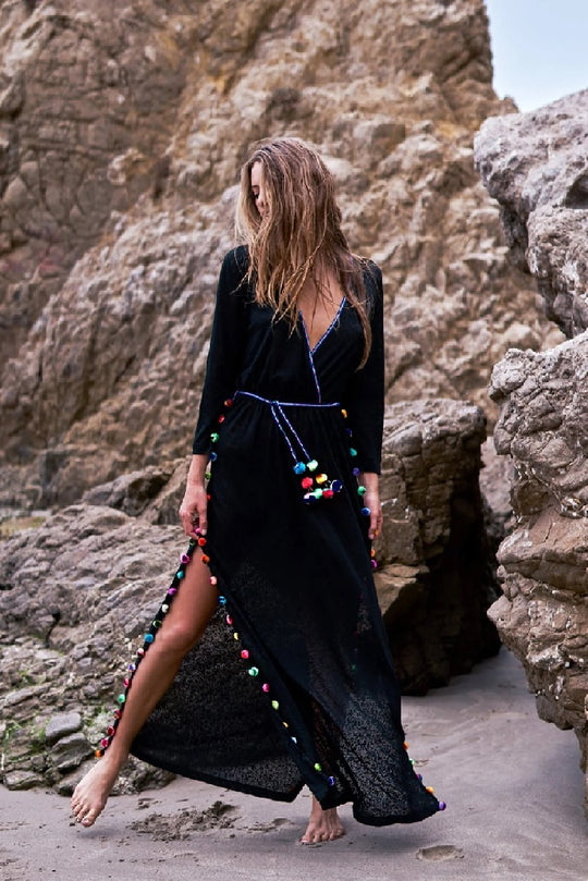 Model posing in Black Summer Midi Dress