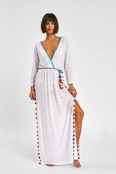 Woman modeling Pitusa's white holiday dress