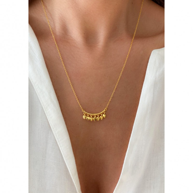 Woman showcasing Multi Heart Necklace by Sara Lashay