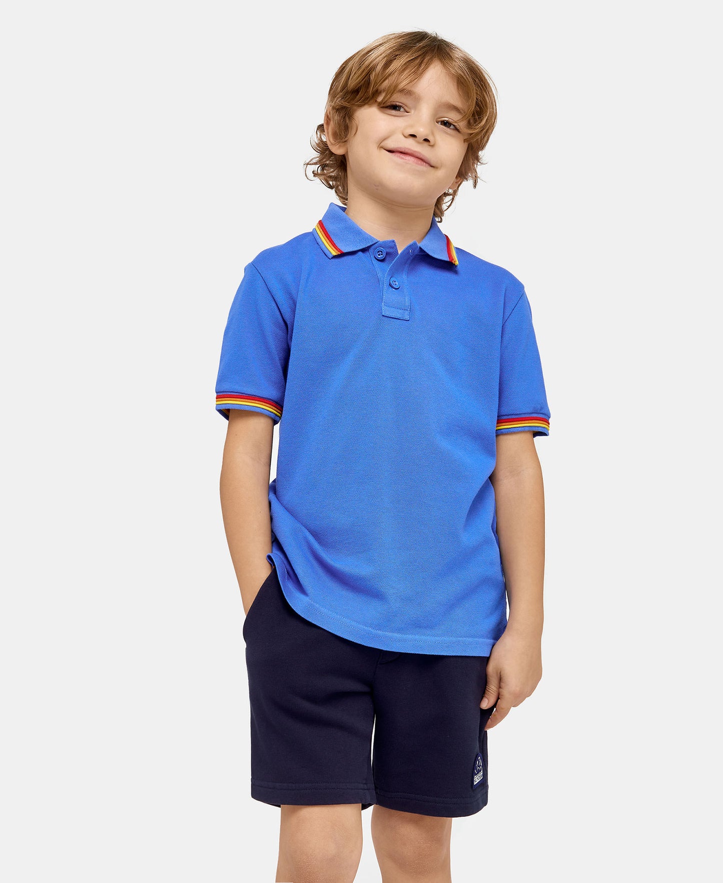 Load image into Gallery viewer, boy wearing a Blue Polo Shirt

