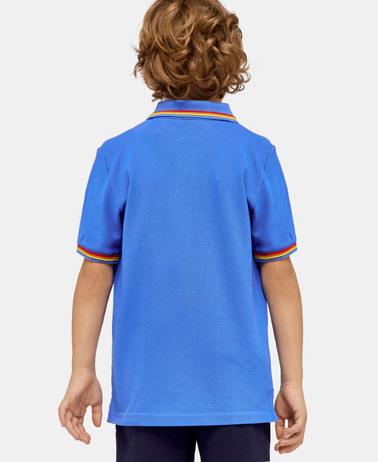 boy wearing a sundek Blue Polo Shirt