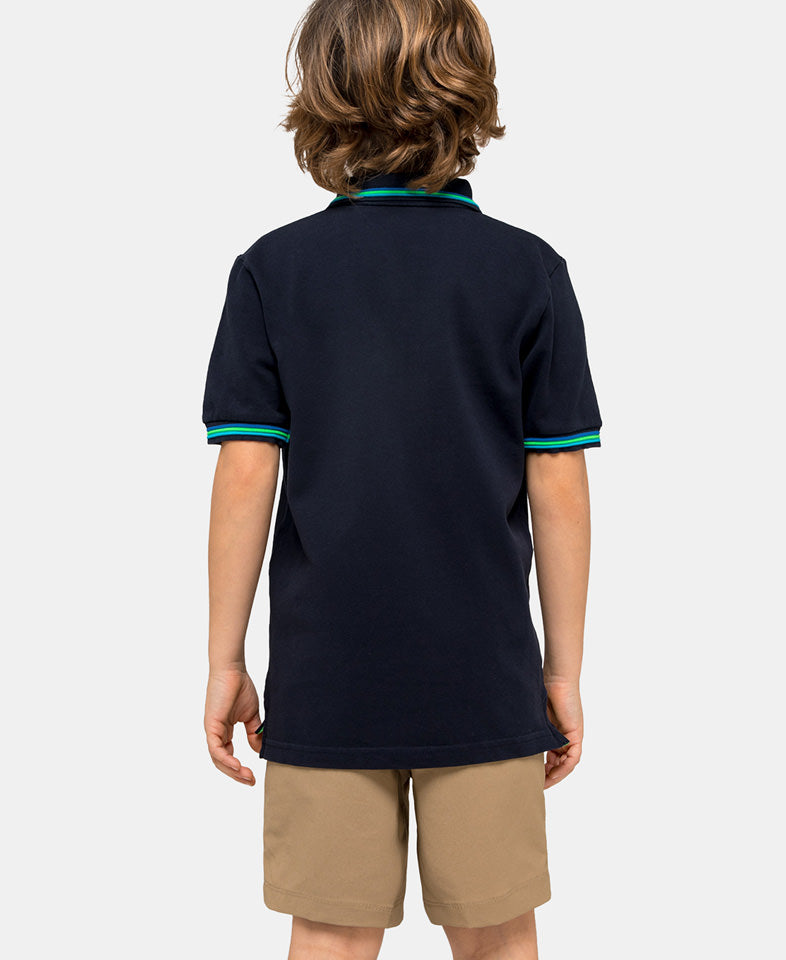 boy wearing a blue polo shirt