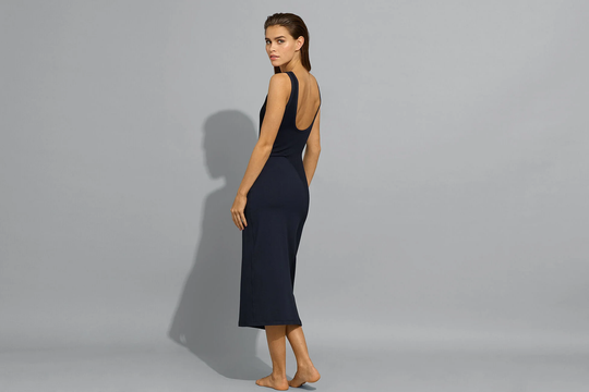 Load image into Gallery viewer, woman wearing a navy blue midi dress
