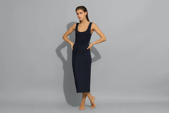 Load image into Gallery viewer, woman wearing dark navy midi dress
