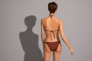 woman wearing eres swimwear