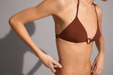 woman wearing ring bikini top