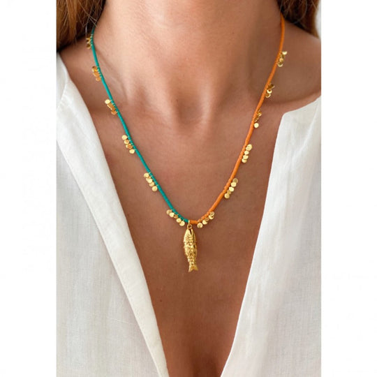 Elegant woman wearing Agate Beaded Necklace by Sara Lashay