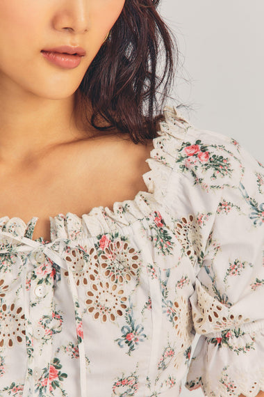 top with square neckline with ruffle trims and self ties