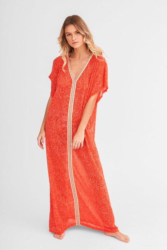 Model flaunting Full Length Beach Cover Up by Pitusa