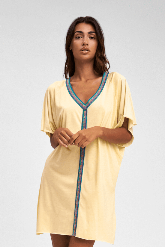 Load image into Gallery viewer, Woman wearing Pitusa beach cover-up
